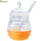 感動的な棒の水晶小型蜂蜜の瓶が付いている2つのタイプ透明な蜂の蜂蜜の鍋そしてスプーン