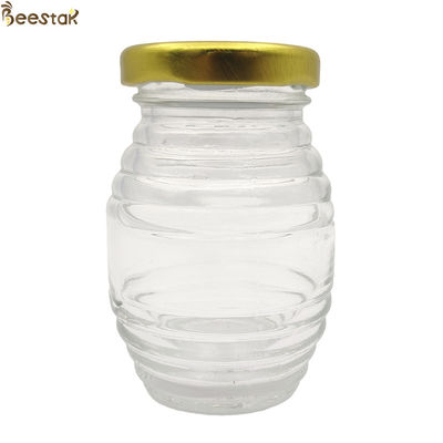 購入 卸し売り透明な150ml 250ml 500mlのタイプEの空のプラスチック蜂蜜の瓶 オンライン製造