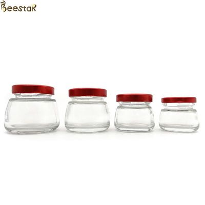 購入 50ml 75ml 120ml 150mlの蜂蜜の瓶およびスプーンのガラス蜂蜜の鍋の瓶 オンライン製造
