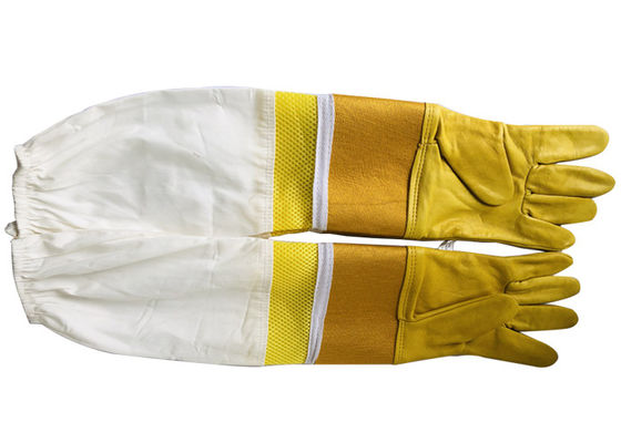#33ヤギの皮の白い布の袖によって換気される黄色い厚いキャンバスの手首の保護装置および半分